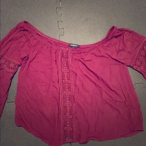Red off the shoulder shirt